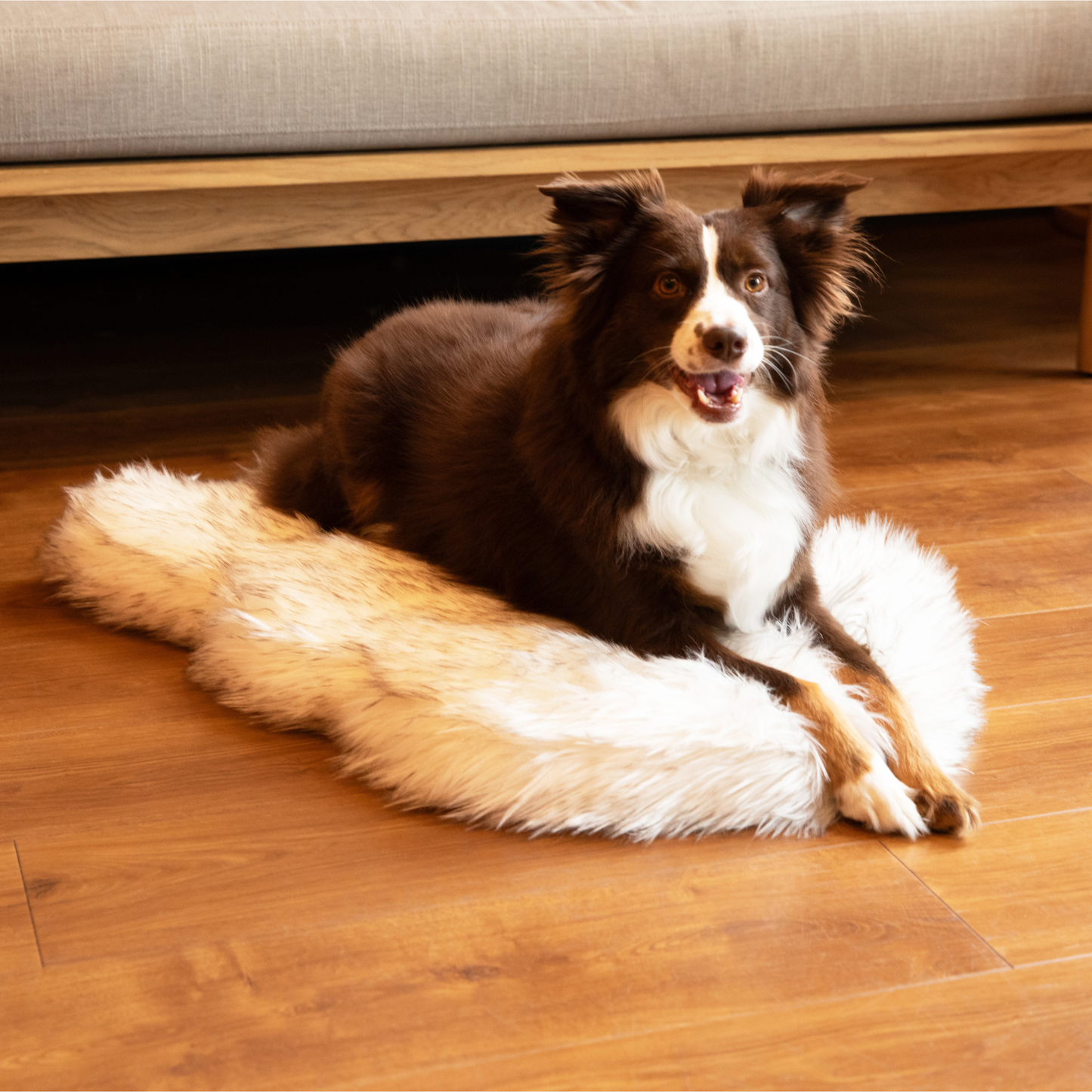 Orthopedic dog bed made of faux fur - curve white with brown accents
