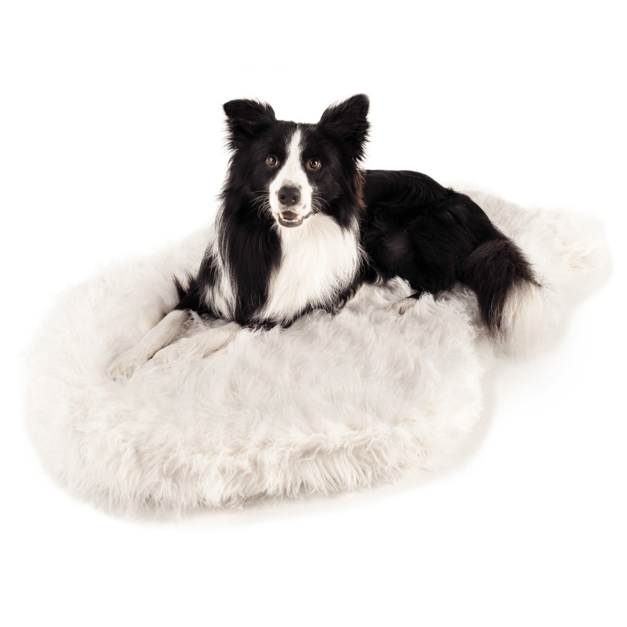 Orthopedic dog bed made of faux fur with free red and black checked duvet cover